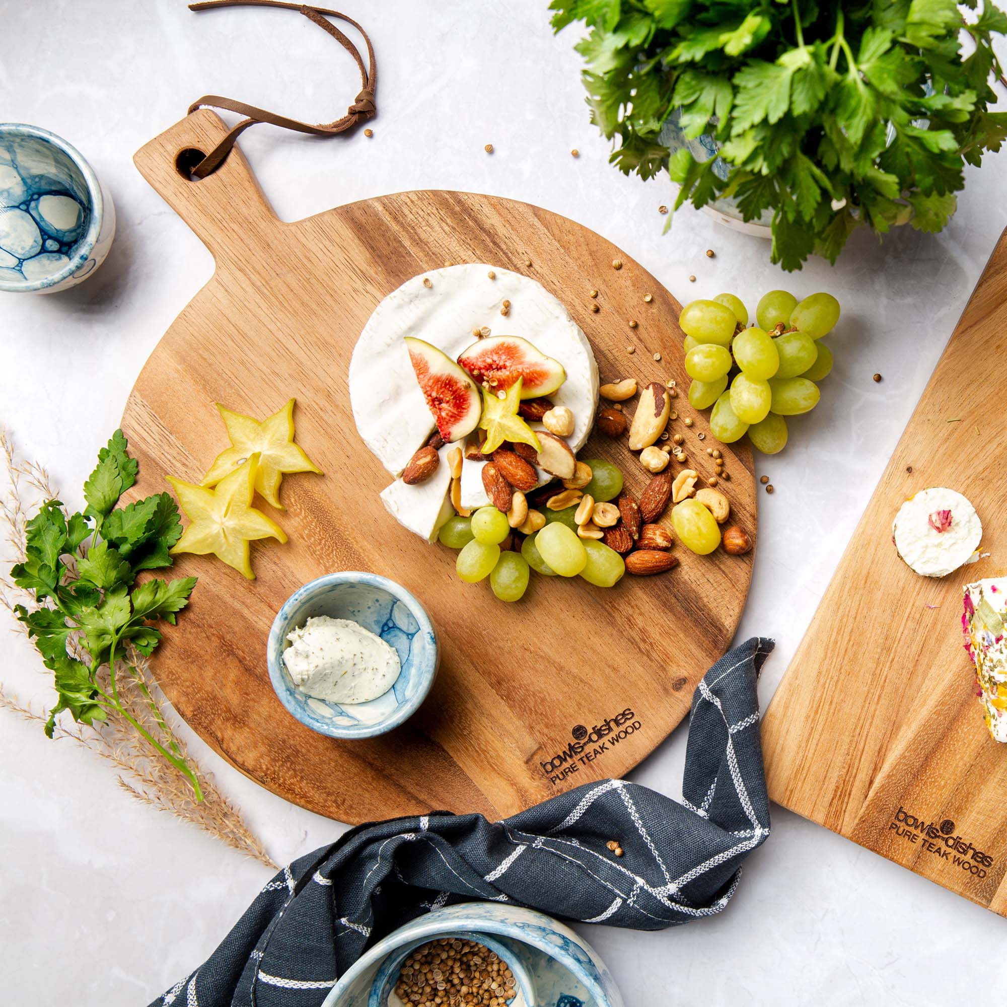 Pure Teak Wood Serveerplank rond met handvat Ø 25 x 2cm